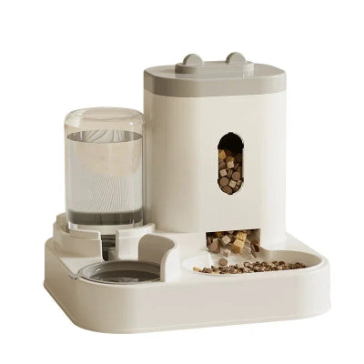 Pet feeding and water station with multiple compartments on a white background