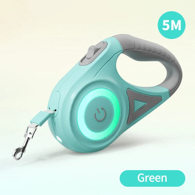 Green retractable dog leash with a handle on a light beige background