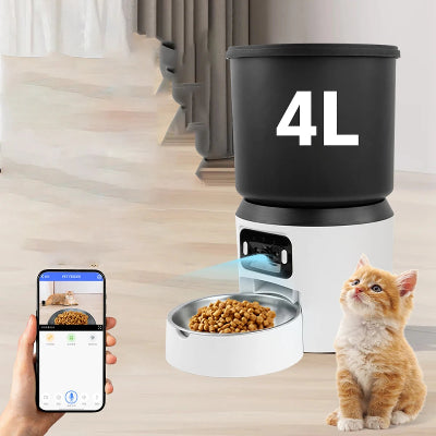 Pet food dispenser with a smartphone app interface, showing a cat and food bowl on a wooden floor.
